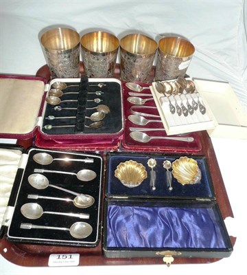 Lot 151 - Four Boodle & Dunthorne plated beakers, a pair of cased silver shell salts and silver and...