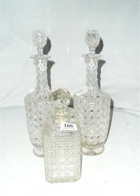 Lot 166 - Three cut glass decanters