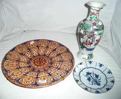 Lot 191 - Copper lustre pottery plaque, blue and white tin glaze plate and famille vert baluster vase