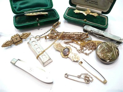 Lot 194 - Four bar brooches, two pins, three gold chains, a silver ingot, a locket silver heart lock, two...