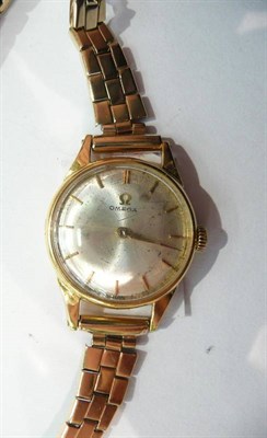 Lot 242 - An 18ct gold lady's wristwatch signed Omega, with an associated 9ct gold bracelet