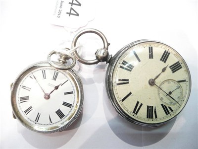 Lot 244 - A silver open faced pocket watch and a fob watch stamped 'fine silver'