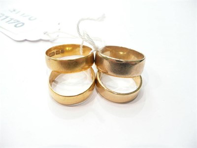 Lot 247 - Four gold wedding bands (4)