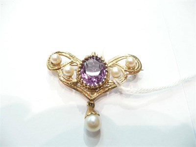 Lot 250 - An amethyst and pearl brooch