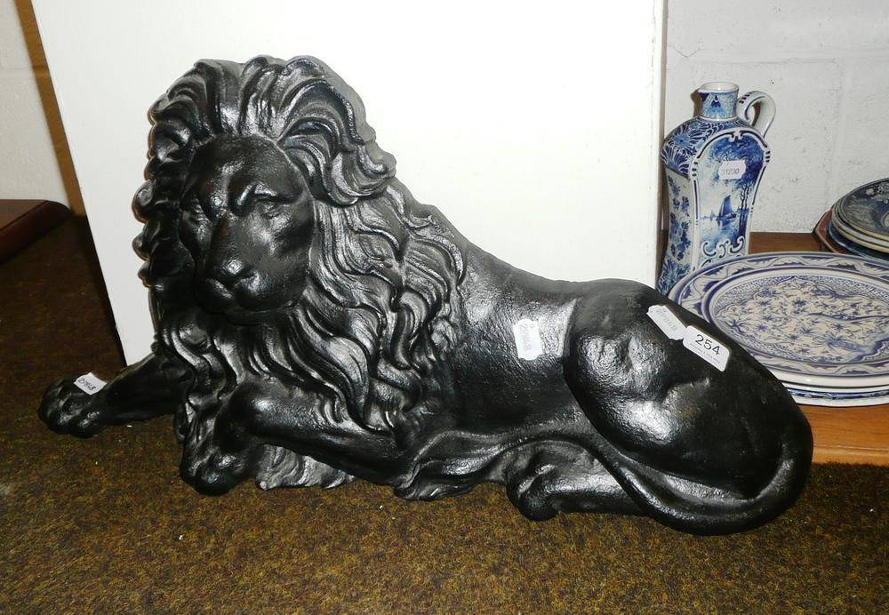 Lot 254 - Cast iron lion