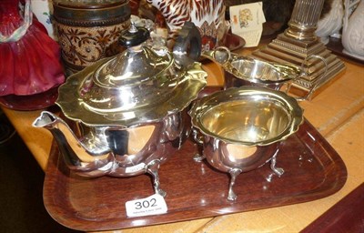 Lot 302 - Three piece silver tea and coffee service and a small jug