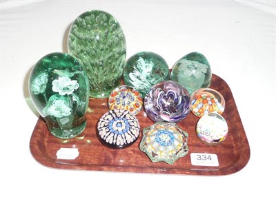 Lot 334 - Four Victorian green glass dumps and other paperweights