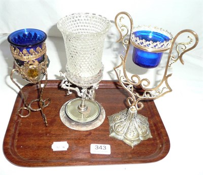 Lot 343 - Two brass framed night light holders and one other