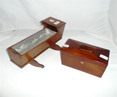 Lot 344 - A 19th century tea caddy and a mahogany cradle