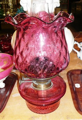 Lot 347 - Cranberry oil lamp base and shade