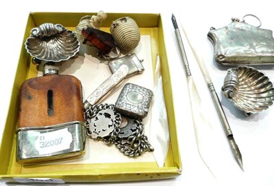 Lot 348 - Hinged silver purse, two silver shell dishes, two novelty tape measures, silver fobs, vestas etc