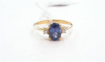 Lot 351 - Blue sapphire and diamond ring