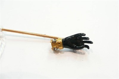 Lot 362 - A stick pin modelled as a glove hand