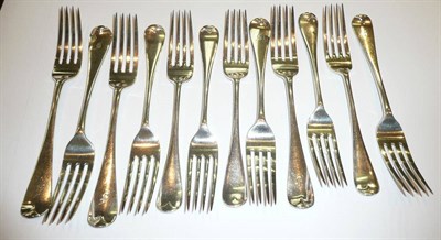 Lot 381 - Two sets of six silver forks