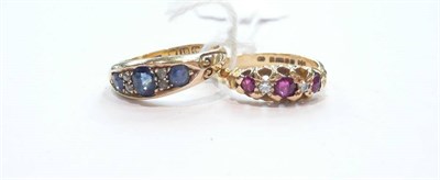 Lot 389 - An 18ct gold sapphire and diamond ring, and a ruby and diamond ring (2)