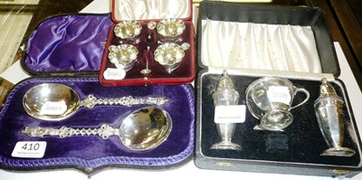 Lot 410 - A cased silver condiment set, Sheffield 1956, Viners Ltd., cased set of four small salts and...