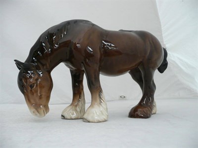 Lot 433 - Beswick brown grazing Shire Horse, model No. 1050, gloss, 14cm high