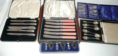 Lot 452 - A set of six Art Deco coffee spoons, two sets of plated fruit knives, a cased set of silver...