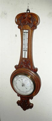 Lot 577 - Carved oak aneroid barometer