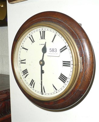 Lot 583 - Small oak-cased wall clock