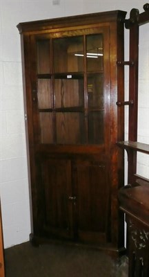 Lot 593 - Oak floor standing glazed corner cupboard