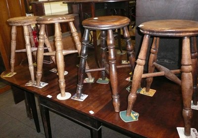 Lot 621 - Four assorted stools, carved oak open wall shelves, fire screen and magazine rack (7)