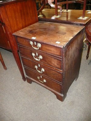 Lot 629 - George III mahogany commode chest