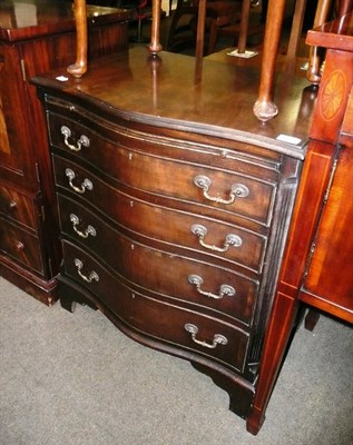 Lot 633 - Reproduction mahogany serpentine chest of drawers