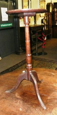 Lot 634 - Oak candle stand