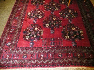 Lot 643 - Afghan rug, North Afghanistan, with blood red field