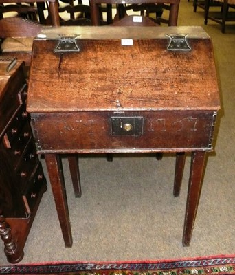 Lot 648 - An 18th century boarder oak box with carved frieze gh 1707 ?