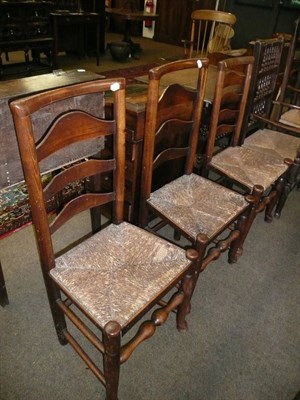 Lot 663 - Three assorted 19th century ladder-back chairs