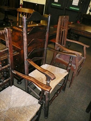 Lot 664 - Ladder back armchair and oak armchair