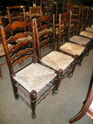 Lot 665 - Composite set of eight ladder back dining chairs