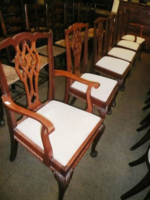 Lot 666 - A set of six Chippendale style dining chairs (4 + 2 carvers)