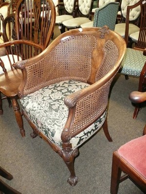 Lot 672 - 1930's walnut framed bergere armchair