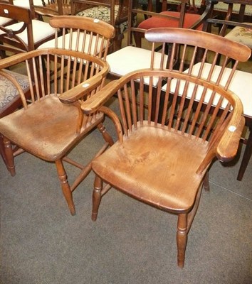 Lot 676 - Pair of comb back chairs