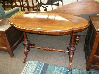 Lot 697 - Oval rosewood side table