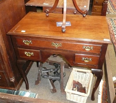 Lot 701 - Georgian mahogany lowboy