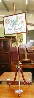 Lot 702 - Mahogany pole screen with crewelwork insert