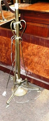 Lot 735 - A brass Art Nouveau standard lamp