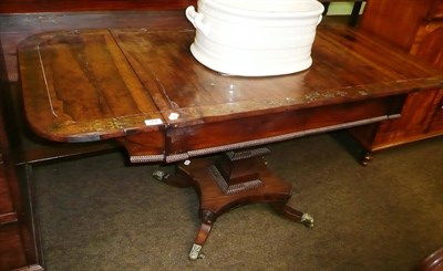 Lot 761 - A regency rosewood and brass sofa table