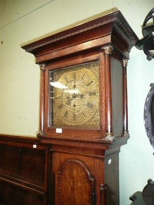 Lot 770 - An oak longcase clock, with brass face, weights and disc