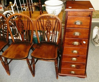 Lot 786 - Four wheel back Windsor chairs, reproduction pyramid shaped chest of drawers, pine side table,...