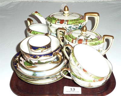 Lot 13 - Noritake teapot, cream jug, and sucrier, and two cups and saucers and a trio