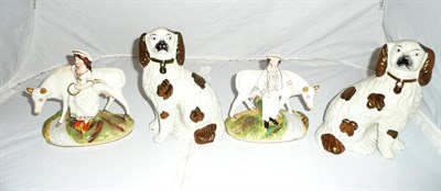 Lot 28 - Pair of Staffordshire dogs with lustre decoration and a pair of cow and calf groups