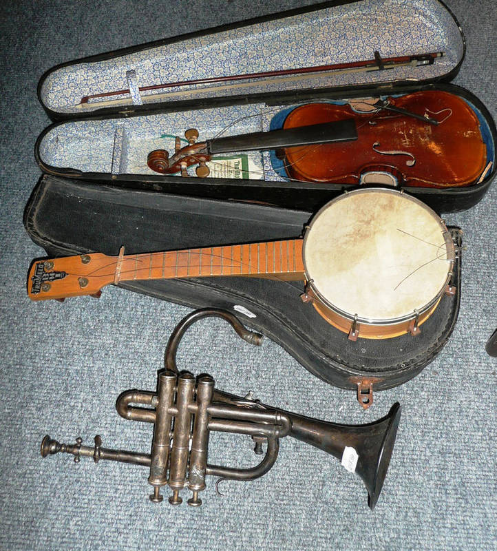 Lot 52 Cased violin, ukulele banjo and trumpet