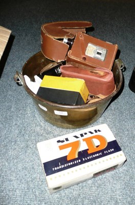 Lot 53 - Quantity of cameras and accessories in brass pan