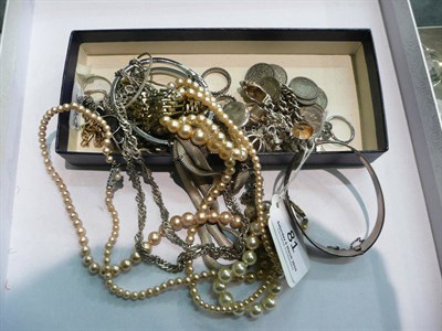 Lot 81 - A silver bangle, charm bracelet and coin bracelet and assorted costume jewellery