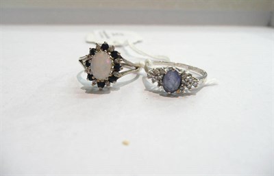 Lot 92 - A 9 carat gold sapphire and diamond ring and an opal sapphire and diamond cluster ring